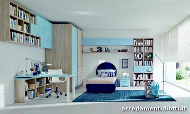 Centro dell'attenzione di questa cameretta Seipersei la scrivania e la libreria che si raccordano in appoggio alla cabina armadio.
