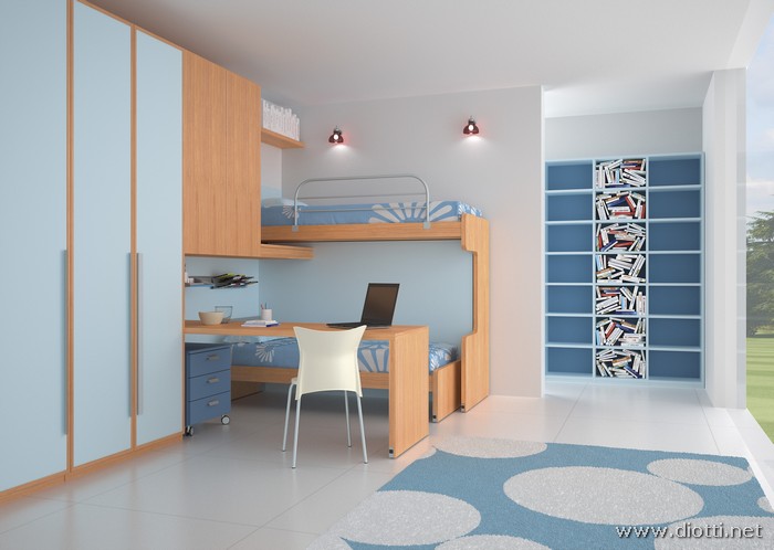 La classica soluzione del letto a castello viene rivoluzionata da questa cameretta realizzata con la collezione Young, serio ma luminoso l'abbinamento fra legno di ciliegio e laccato azzurro.